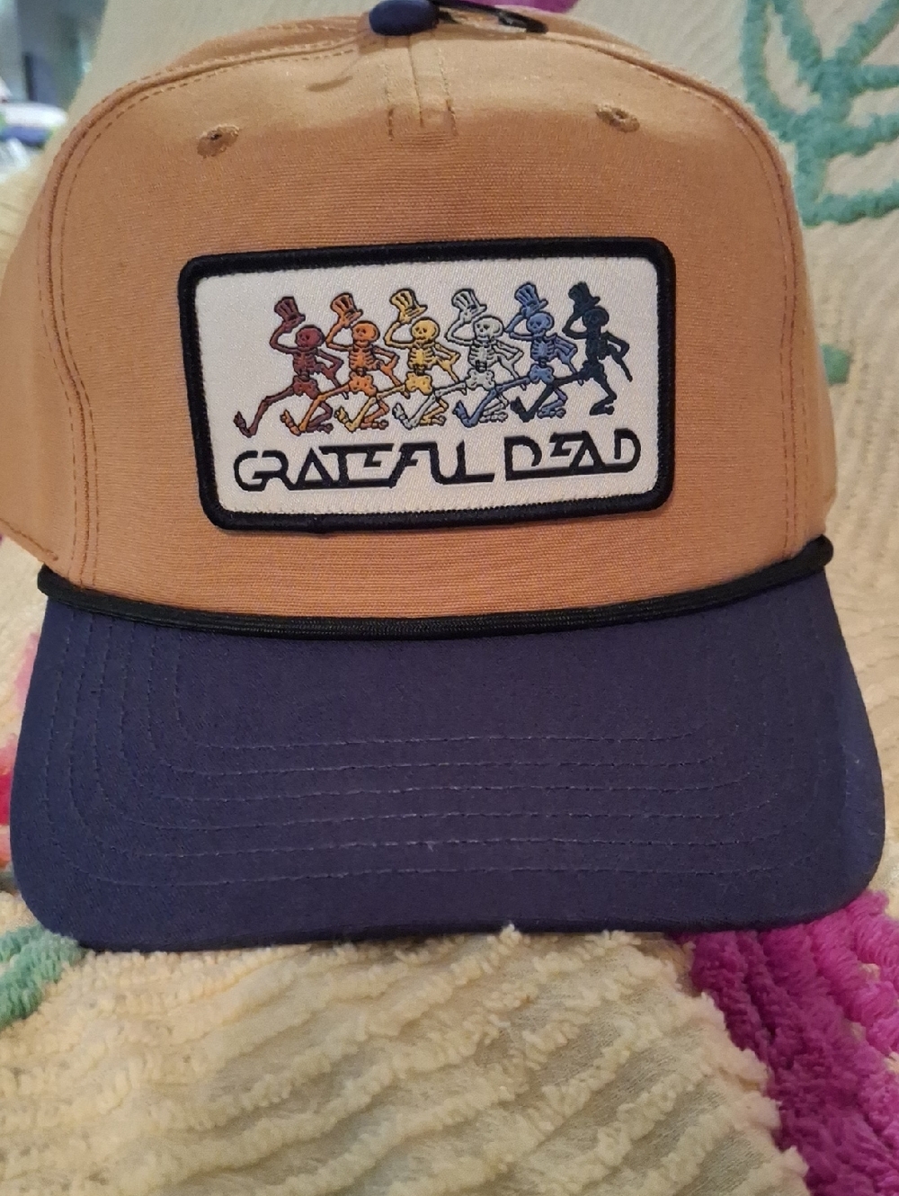 Grateful Dead Tan & Navy Trucker Hat with Rainbow Dancing Skeletons Patch